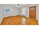 Bright living room features gleaming hardwood floors and lots of natural light from large windows at 1907 Rose St., Conway, SC 29527