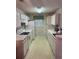 Functional kitchen with white cabinets and appliances, ready for home cooking at 193 Charter Dr. # E3, Longs, SC 29568