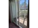 View from the interior to the screened in patio; community and exterior can be seen at 193 Charter Dr. # E3, Longs, SC 29568