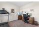 Bedroom with treadmill, desk, and multiple monitors at 194 Zostera Dr., Little River, SC 29566