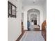 Bright foyer with hardwood floors and arched doorways leads into the living spaces at 194 Zostera Dr., Little River, SC 29566