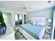 Cozy bedroom with large mirror closet doors, king bed and bright natural light at 201 N Hillside Dr. # 311-A, North Myrtle Beach, SC 29582