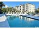The community pool surrounded by lounge chairs is perfect for relaxing afternoons at 201 N Hillside Dr. # 311-A, North Myrtle Beach, SC 29582