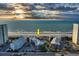 Aerial view of ocean-front condo building with beach access and community pool at 208 N Ocean Blvd. # 321, North Myrtle Beach, SC 29582