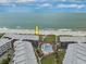 Panoramic aerial view showcases a stunning beachside condo community near the ocean at 208 N Ocean Blvd. # 321, North Myrtle Beach, SC 29582