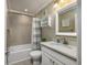 Bright bathroom with a shower-tub combo and vanity at 208 N Ocean Blvd. # 321, North Myrtle Beach, SC 29582