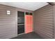 Exterior view of the front door to unit 321 featuring a screen door and storm door at 208 N Ocean Blvd. # 321, North Myrtle Beach, SC 29582