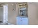 Hallway with a granite-topped cabinet and mirror at 208 N Ocean Blvd. # 321, North Myrtle Beach, SC 29582