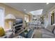 Bright, open-concept living area featuring a dining table, comfortable seating, and a well-lit workspace at 208 N Ocean Blvd. # 321, North Myrtle Beach, SC 29582