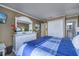 Well-lit main bedroom featuring a dresser and large closet at 208 N Ocean Blvd. # 321, North Myrtle Beach, SC 29582