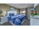 Comfortable main bedroom with a king-size bed and view of the ocean at 208 N Ocean Blvd. # 321, North Myrtle Beach, SC 29582