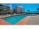 Refreshing outdoor pool with comfortable lounge chairs and relaxing shaded pergola seating at 208 N Ocean Blvd. # 321, North Myrtle Beach, SC 29582