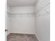 Walk-in closet features white wire shelving for storage and organization, and neutral carpet at 211 Seasons Trace Loop, Longs, SC 29568