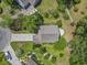 Aerial view of home with a mature tree canopy, lush landscaping, and extra parking area at 215 Carolina Farms Blvd., Myrtle Beach, SC 29579