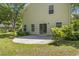 The backyard features a patio and lush green space at 215 Carolina Farms Blvd., Myrtle Beach, SC 29579