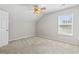 Bedroom with ceiling fan and natural light from a large window at 215 Carolina Farms Blvd., Myrtle Beach, SC 29579