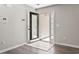 Welcoming foyer with tile entry and glass-paneled door, offering a glimpse of the home's interior at 215 Carolina Farms Blvd., Myrtle Beach, SC 29579