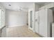 Tile kitchen with pantry, white cabinets and refrigerator at 215 Carolina Farms Blvd., Myrtle Beach, SC 29579