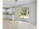 Bright kitchen with white cabinets and stainless steel sink at 215 Carolina Farms Blvd., Myrtle Beach, SC 29579