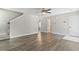 Open living room with wood floors, ceiling fan and staircase at 215 Carolina Farms Blvd., Myrtle Beach, SC 29579
