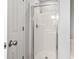 Clean shower with glass doors and updated fixtures in the bathroom at 215 Carolina Farms Blvd., Myrtle Beach, SC 29579