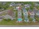 Overhead view of homes featuring private pools and balconies in a desirable coastal neighborhood at 215-B S Dogwood Dr., Surfside Beach, SC 29575