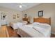 Bright bedroom features two double beds and a sunny view to the adjoining bathroom at 215-B S Dogwood Dr., Surfside Beach, SC 29575