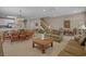 Expansive living area with a staircase, dining space, and comfortable seating at 215-B S Dogwood Dr., Surfside Beach, SC 29575