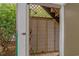 Outdoor shower space showing shower fixtures and wooden privacy enclosure at 215-B S Dogwood Dr., Surfside Beach, SC 29575