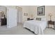 Bedroom with ensuite doors open with doorway views to kitchen and living room at 217 Wando River Rd. # 12-H, Myrtle Beach, SC 29579