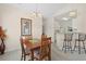 Cozy dining area features pendant lighting and flows into the adjacent kitchen at 217 Wando River Rd. # 12-H, Myrtle Beach, SC 29579