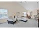 Bright living room with large windows, vaulted ceiling, and dining area at 217 Wando River Rd. # 12-H, Myrtle Beach, SC 29579