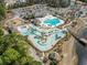 Overhead view of community pool area with water park features, clubhouse, and nearby parking at 2170 Buxton Dr., Myrtle Beach, SC 29579