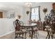 Dining area with chandelier lighting fixture and view of outdoor window and light-colored flooring at 2170 Buxton Dr., Myrtle Beach, SC 29579