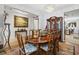 Formal dining room boasts a chandelier, decorative china cabinet and a classic wooden dining table at 2170 Buxton Dr., Myrtle Beach, SC 29579