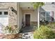 Charming front porch with brick accents, landscaped garden, and a welcoming entrance at 2170 Buxton Dr., Myrtle Beach, SC 29579