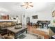 Spacious living room with hardwood floors, piano, and comfortable seating at 2170 Buxton Dr., Myrtle Beach, SC 29579