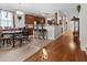 Open living and dining area with hardwood flooring, breakfast bar and adjacent access to other rooms at 2170 Buxton Dr., Myrtle Beach, SC 29579