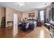 Cozy bedroom with hardwood floors, calming colors, and relaxing atmosphere at 2170 Buxton Dr., Myrtle Beach, SC 29579