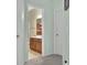 Bathroom view from hall offers a glimpse into a practical designed and comforting space at 2302 Clandon Dr., Myrtle Beach, SC 29579