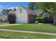 Exterior of a home featuring a two car garage, brick and grass lawn at 2302 Clandon Dr., Myrtle Beach, SC 29579