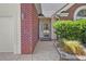 Inviting front entrance with a brick exterior and landscaped walkway at 2302 Clandon Dr., Myrtle Beach, SC 29579