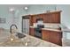 Modern kitchen featuring stainless steel appliances, granite countertops, and beautiful wood cabinetry at 2302 Clandon Dr., Myrtle Beach, SC 29579