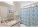 Charming bathroom includes granite counters, single sink, and shower-tub combo at 2506 Berleze Ct., Conway, SC 29527