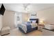 Inviting bedroom with a ceiling fan, beside tables, and a bright window at 2506 Berleze Ct., Conway, SC 29527