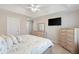 Bright bedroom with a ceiling fan and television is perfect for relaxing at 2506 Berleze Ct., Conway, SC 29527