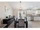 Elegant dining room with a view of the kitchen, complemented by stylish decor at 2506 Berleze Ct., Conway, SC 29527