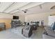 This garage features a sitting area, TV and ample room for parking and storage at 2506 Berleze Ct., Conway, SC 29527