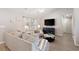 Comfortable living room with high ceilings, neutral walls, and an entertainment center at 2506 Berleze Ct., Conway, SC 29527