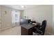 This office features neutral walls, carpet flooring, a modern desk, and natural light from the window at 2506 Berleze Ct., Conway, SC 29527